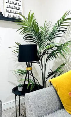 a lamp on a table next to a couch at Lovat House - Large 6-Bedroom Property in Preston