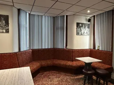 a waiting room with a couch and a table at Cadeby Lodge in Blackpool