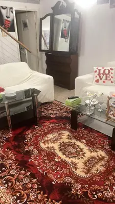 a living room with a rug on the floor at Chic & Central Liverpool Flat in Liverpool