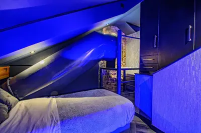 a bedroom with a bed with a blue ceiling at Brierley Club Hideaway Chic 7 Star Retreat in Rishton