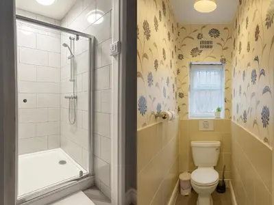 a bathroom with a toilet and a shower at Rest and Welcome B&B, Blackpool in Blackpool