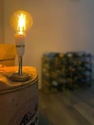 a light on top of a can of beer at The Docklands XL by Serviced Living Liverpool in Liverpool