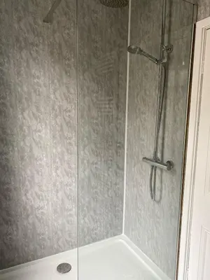 a shower stall with a glass shower door at ML Short Stays - 3 Bedroom House Near BAE in Barrow in Furness