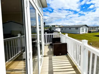 a balcony with a view of a house at Ocean Edge Leisure Park - 21286 in Morecambe