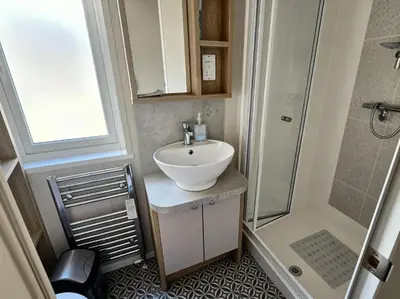a small bathroom with a sink and a shower at Ocean Edge Leisure Park - 21286 in Morecambe