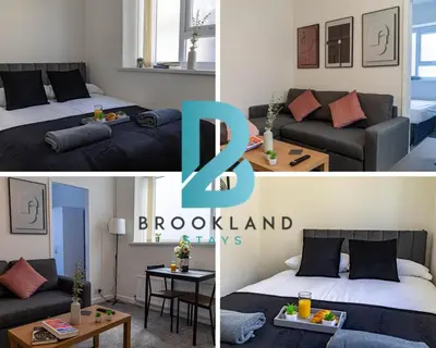 two pictures of a room with a bed and a couch at One Bedroom Flat by Brookland Stays Serviced Accommodation Short Lets Blackpool with Free WiFi in Blackpool