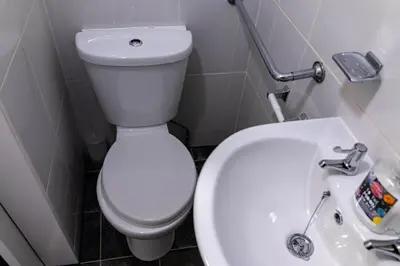 a bathroom with a white toilet and a sink at One Bedroom Flat by Brookland Stays Serviced Accommodation Short Lets Blackpool with Free WiFi in Blackpool
