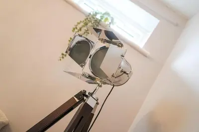 two mirrors on a lamp in a room at The Townhouse Liverpool in Liverpool