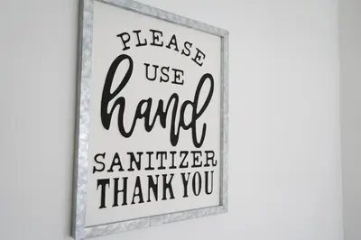a picture of a framed sign that reads please use hand at The Butterfield in Liverpool