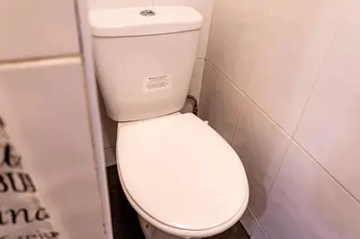 a bathroom with a white toilet in a stall at One Bedroom Apartment by Brookland Stays Serviced Accommodation Short Lets Blackpool with Free WiFi in Blackpool
