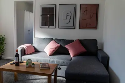 a living room with a couch and a table at One Bedroom Apartment by Brookland Stays Serviced Accommodation Short Lets Blackpool with Free WiFi in Blackpool