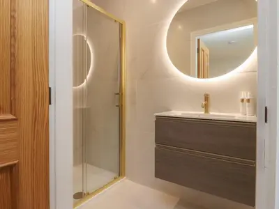 a bathroom with a sink and a mirror at Alston House in Preston