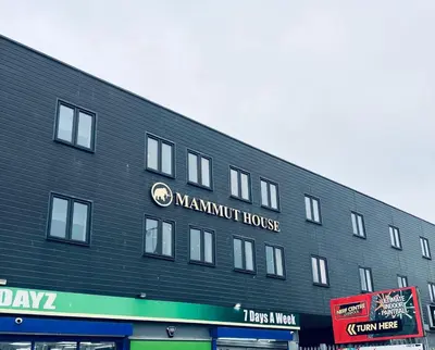 a large black building with a manmit house at Mammut House in Liverpool