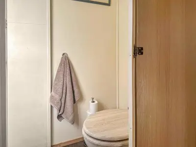a bathroom with a toilet and a towel on the wall at Croft - Uk50042 in Clitheroe