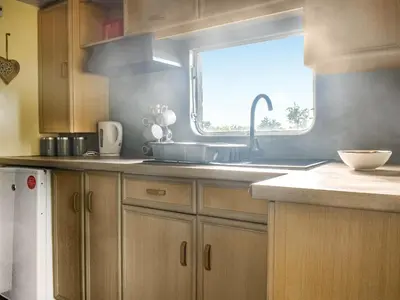 a kitchen with a sink and a window at Croft - Uk50042 in Clitheroe