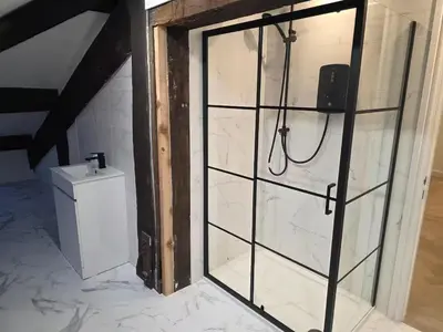a bathroom with a shower and a toilet at Liverpool Penthouse - Sleeps 8 - City Centre in Liverpool