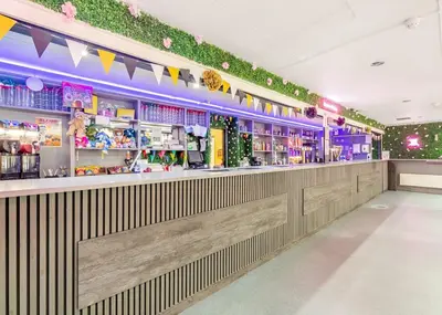 a bar in a restaurant with lights and decorations at Beacon Fell View in Longridge