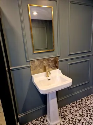 a bathroom with a sink and a mirror at Hamilton - The Hyde Luxury Let in Preston