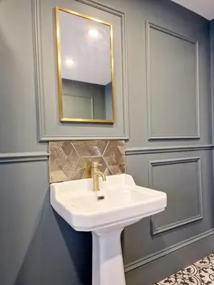 a bathroom with a white sink and a mirror at Hamilton - The Hyde Luxury Let in Preston