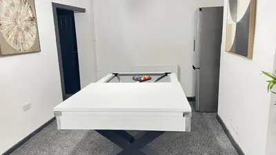 a white ping pong table in a room at Premium Luxury Home by Anfield & City Centre in Liverpool