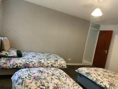 a hotel room with two beds in a room at Blackpool San Remo Bungalows 9 & 10 in Blackpool
