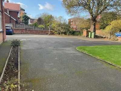 an empty parking lot in a residential neighborhood at Southport-Birkdale Luxury Haven in Southport