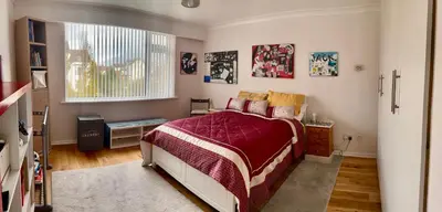 a bedroom with a bed and a window at Southport-Birkdale Luxury Haven in Southport