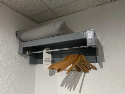 a shelf with a bunch of utensils on a wall at Waverley Beach Hotel in Blackpool