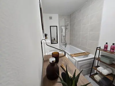 a bathroom with a sink and a toilet and a tub at Room 2 Shared House 3 min from Stadium in Liverpool