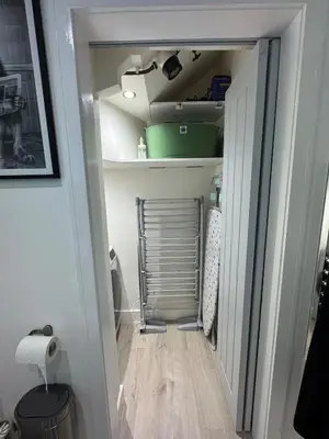 a hallway with a door open to a room at Cosy Modern 2 Beds Chorley Center in Chorley