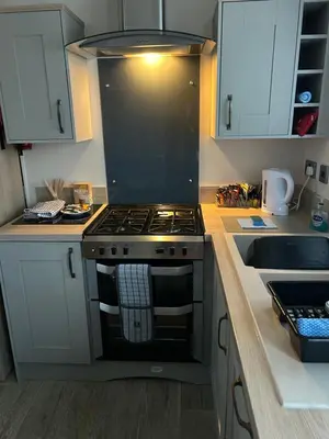 a kitchen with a stove and a sink at Haven Cala gran in 2026 through to Jan 2027 spring summer winter breaks Blackpool Fleetwood entire home 6 people seaside holiday park in Fleetwood