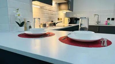 two bowls on a counter in a kitchen at Preston City centre Winckley Square Flat in Preston