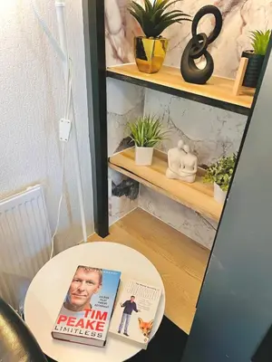 a book sitting on top of a table in a room at Ideal pay-as-you-stay 1-bed apartment in Preston in Preston
