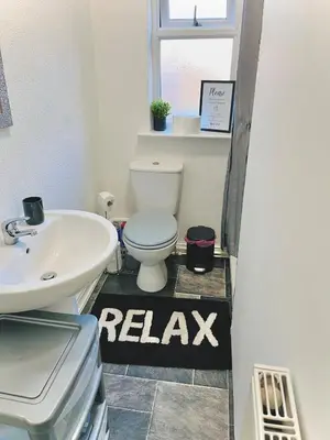 a bathroom with a toilet and a sink at Ideal pay-as-you-stay 1-bed apartment in Preston in Preston