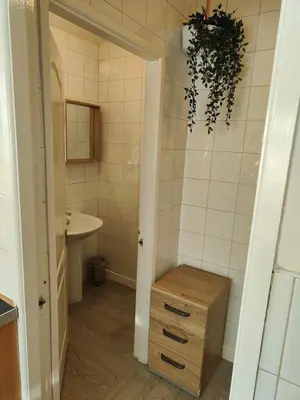 a small bathroom with a sink and a toilet and a sink at Home sweet Home, 2 bedrooms apartment in Liverpool