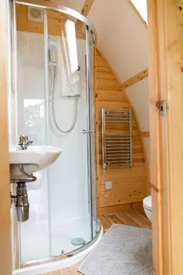 a bathroom with a shower and a sink at Kidsnape Farm by Wigwam Holidays in Goosnargh
