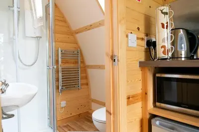 a small bathroom with a toilet and a sink at Kidsnape Farm by Wigwam Holidays in Goosnargh