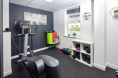 a room with a gym with a treadmill at For Students Only Myrtle Court in Liverpool in Liverpool