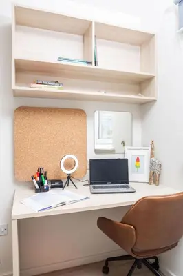 a desk with a laptop computer on top of it at For Students Only The Railyard in Liverpool in Liverpool