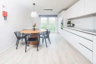 a kitchen and dining room with a table and chairs at For Students Only The Railyard in Liverpool in Liverpool