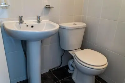 a bathroom with a toilet and a sink at One Bedroom Apartment by Brookland Stays Serviced Accommodation Short Lets Blackpool with Free WiFi in Blackpool