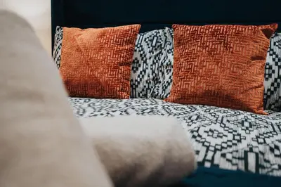 a bed with two pillows at Stunning Central 2 bed Apt, 2 Baths in Liverpool