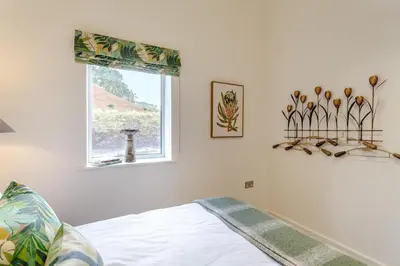 a bedroom with a bed and a window at 2 Bed in Dunsop Bridge oc-w33524 in Newton