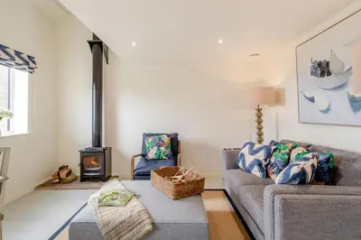 a living room with a couch and a fire place at 2 Bed in Dunsop Bridge oc-w33524 in Newton