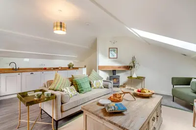 a living room with a couch and a table at 2 Bed in Dunsop Bridge oc-w33525 in Newton