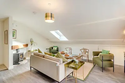 a living room with a couch and a table at 2 Bed in Dunsop Bridge oc-w33525 in Newton