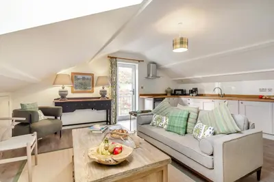 a living room with a couch and a table at 2 Bed in Dunsop Bridge oc-w33525 in Newton