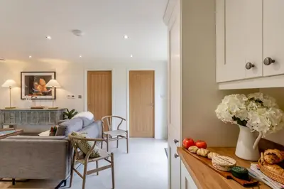 a kitchen and living room with a couch and a table at 2 Bed in Dunsop Bridge oc-w33526 in Newton