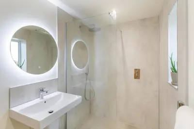 a bathroom with a sink and a shower with a mirror at 2 Bed in Dunsop Bridge oc-w33526 in Newton