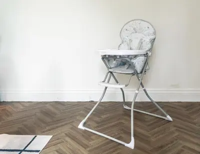 a chair sitting in front of a wall at 5 Bed Stay For Contractors And Families in Morecambe